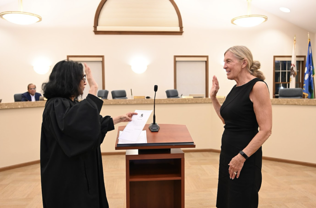 Mayor McCombie's swearing in for another term: Pictured retired Honorable Judge K. Steffen and Mayor P. McCombie. Picture taken by Syed Ullah.